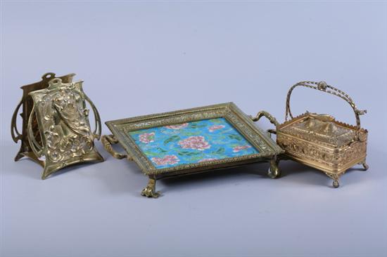 Appraisal: THREE PIECES METALWORK Including bronze-cased ceramic trivet Victorian gilt-metal sardine