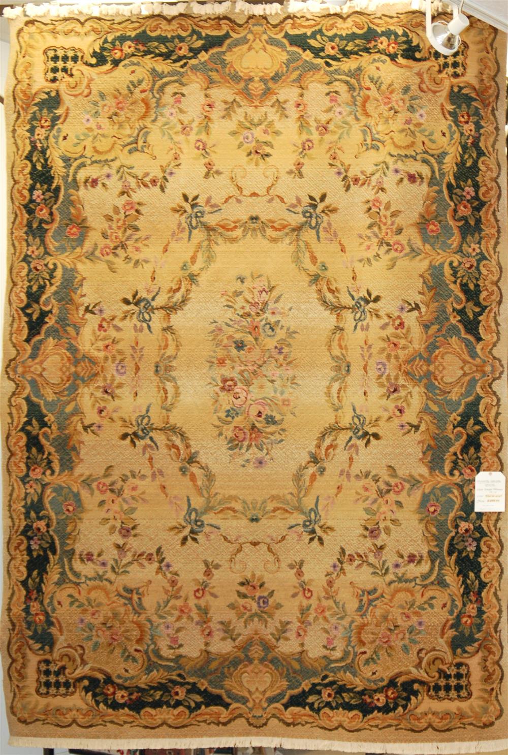 Appraisal: ORIENTAL WEAVERS MACHINE MADE SYNTHETIC RUG having an Aubusson design