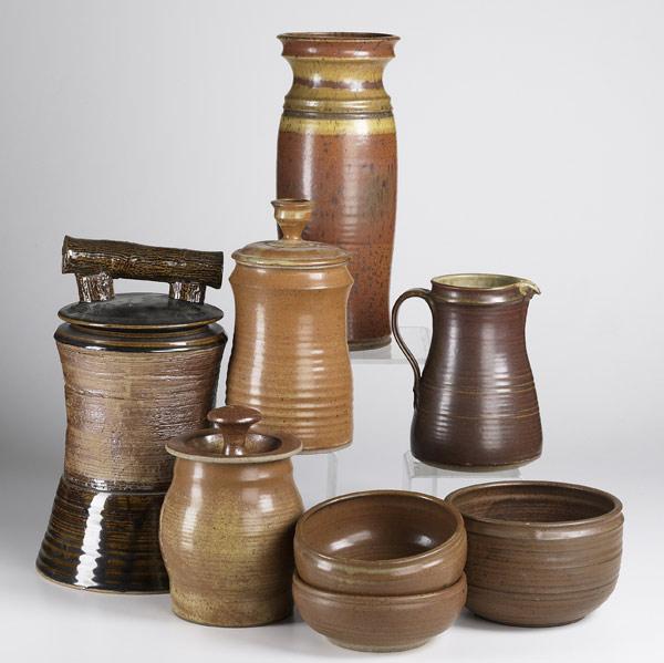 Appraisal: ERIC CUSHING Eight pieces of stoneware include three covered jars