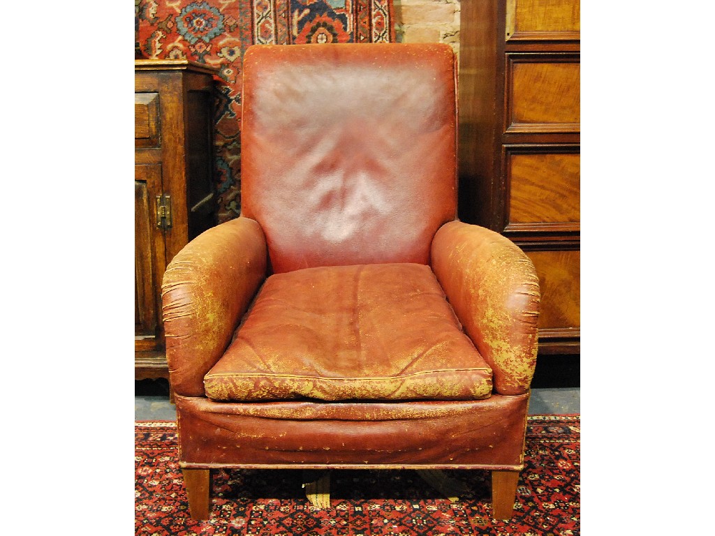 Appraisal: Vintage tan leather armchair