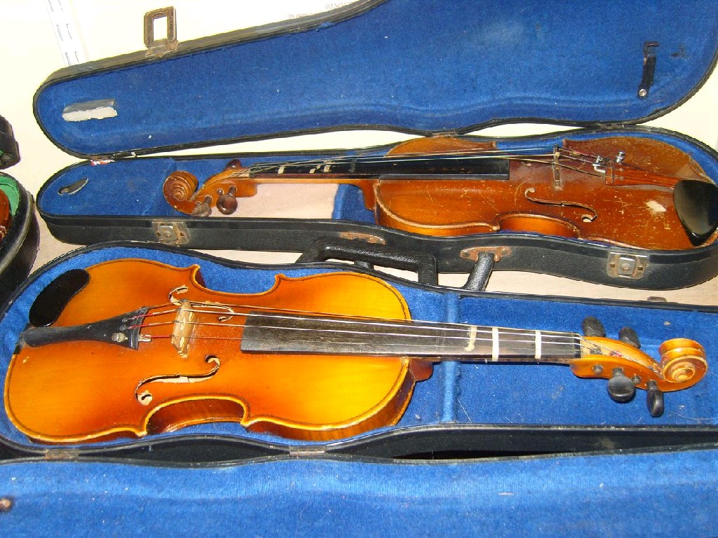 Appraisal: Two cased violins one with Chinese makers label to interior