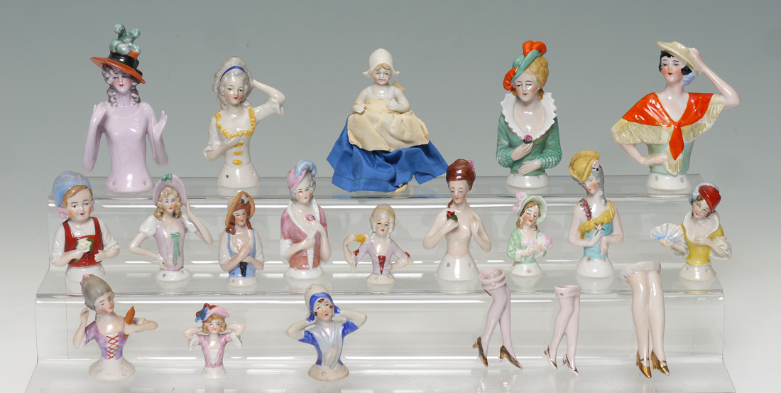 Appraisal: PIECE COLLECTION PORCELAIN HALF DOLLS In varying positions Dutch girls