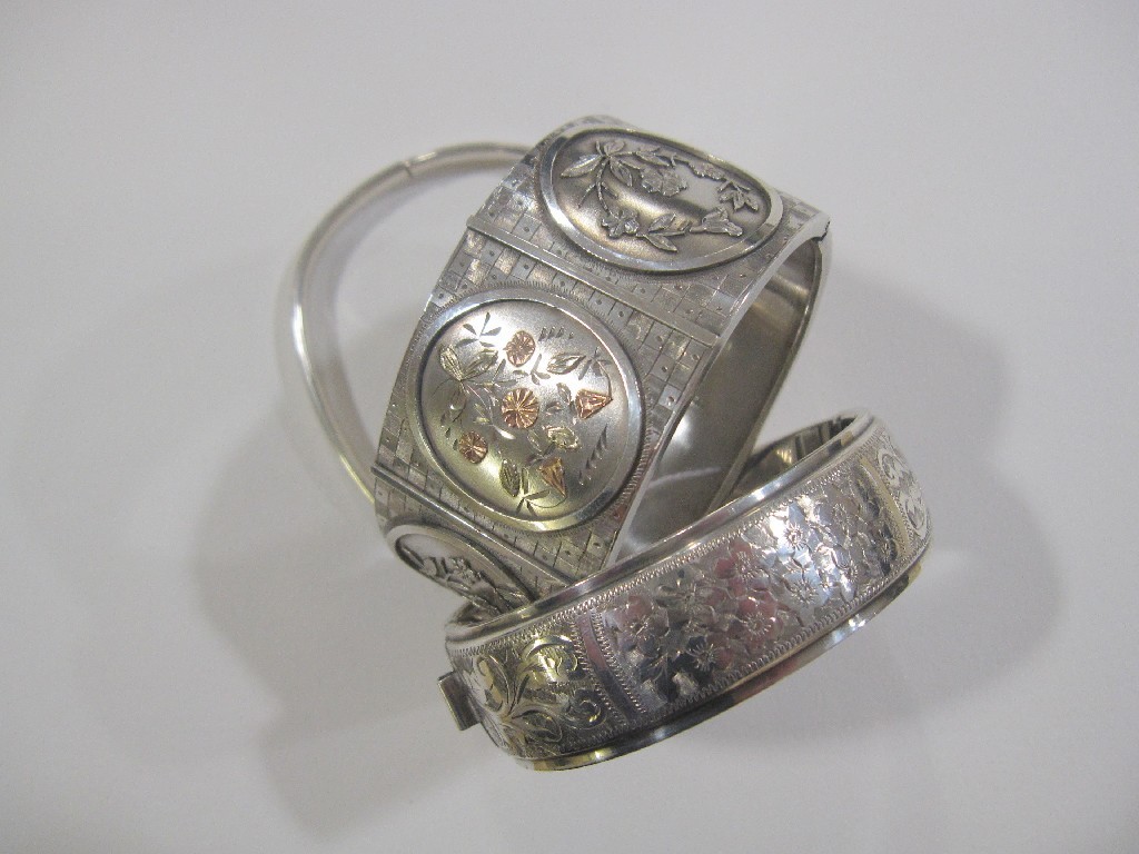 Appraisal: Victorian silver bangle hallmarked Birmingham with embossed floral decoration and