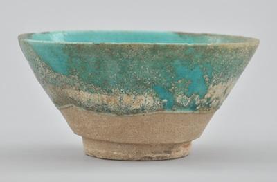 Appraisal: A Raqqa Wear Type Bowl Of conical shape on a