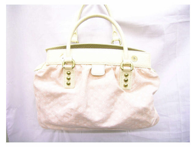 Appraisal: Louis Vuitton handbag pink monogrammed cloth and ivory leather large