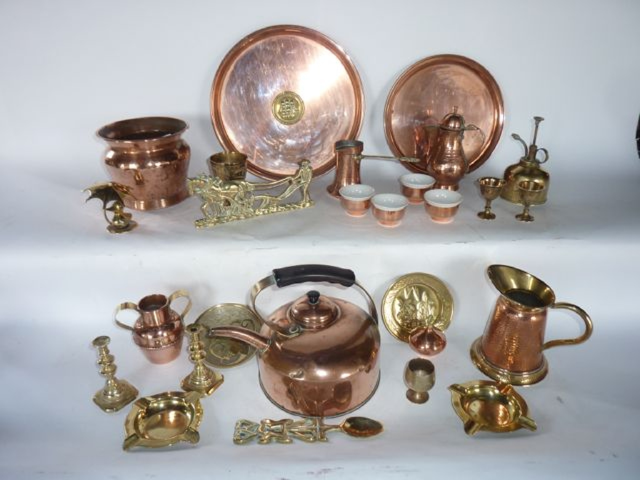 Appraisal: A collection of copper and brassware to include an unusual