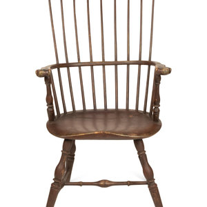 Appraisal: An American Volute-Carved Comb-Back Knuckle-Arm Painted Windsor Armchair New England