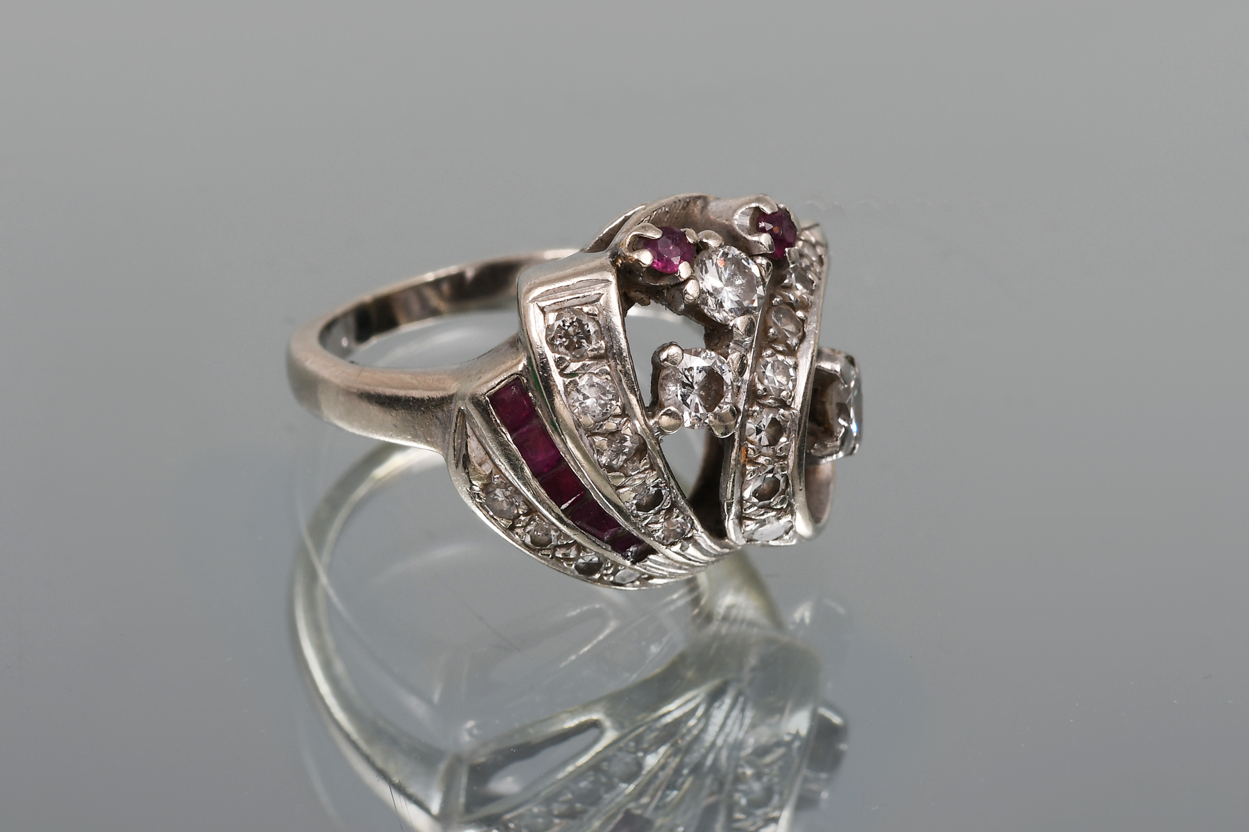 Appraisal: K DIAMOND RUBY RING This lovely K white gold and