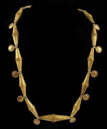 Appraisal: Gold Biconical Bead Necklace with Small Raised Disk Pendants