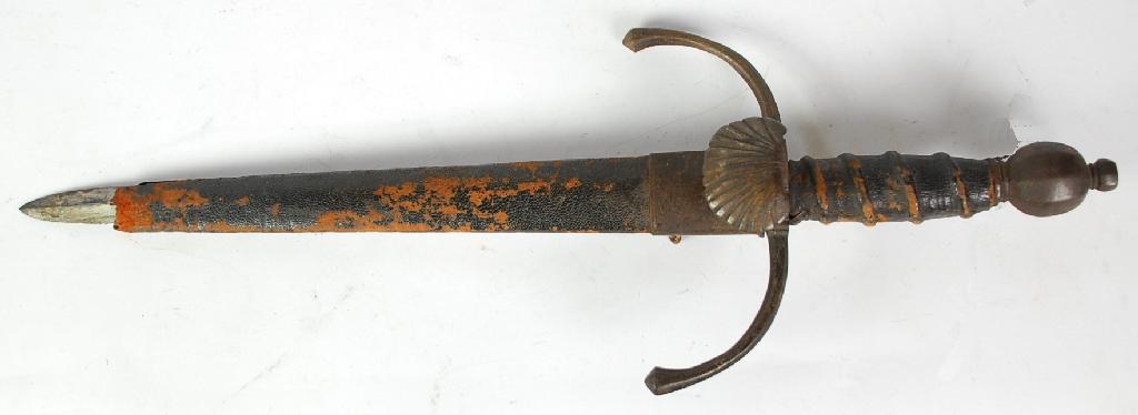 Appraisal: ANTIQUE LEFT HAND STEEL DAGGER the down curved guillons incorporating