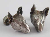 Appraisal: A pair of silver cufflinks designed as bull terriers by