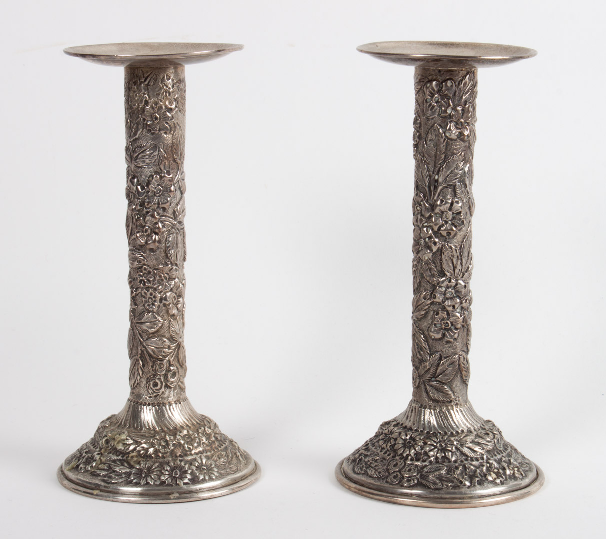 Appraisal: Pair of Schofield repousse sterling candlesticks in H ozt Condition