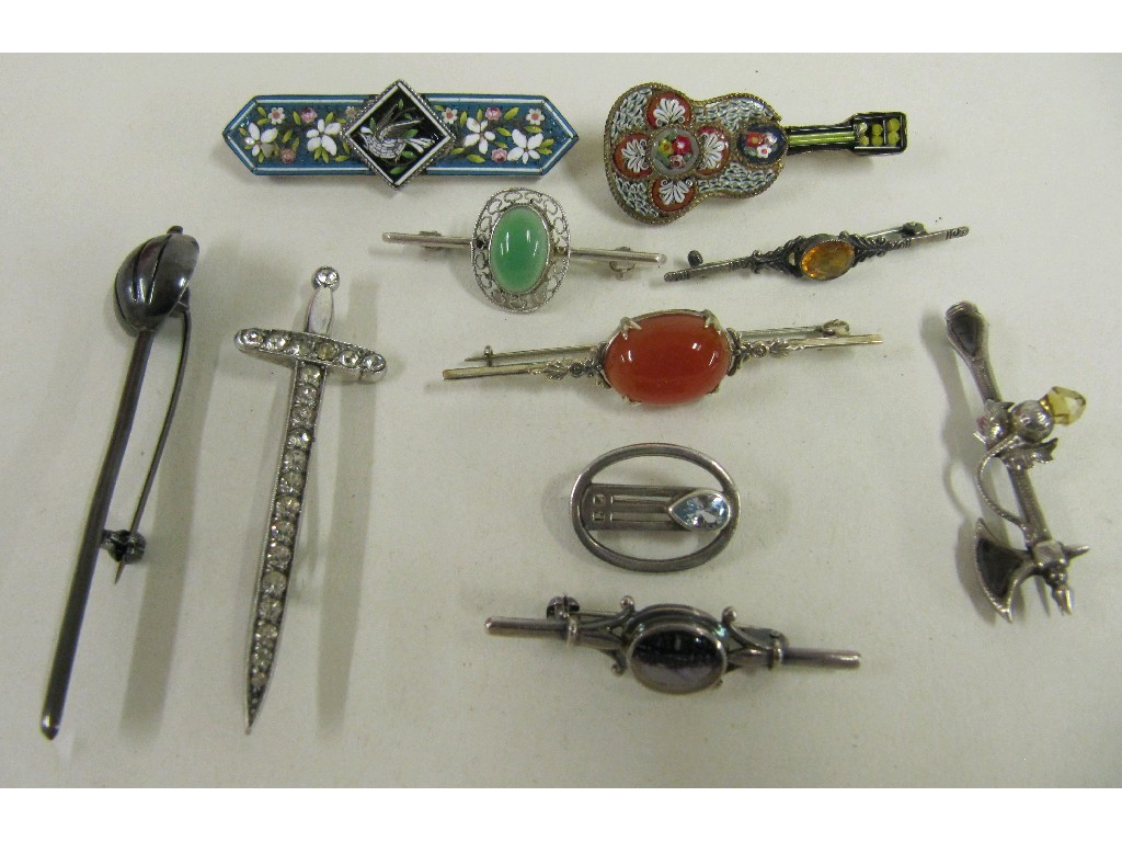 Appraisal: Lot comprising two micro mosaic brooches two silver sword brooches