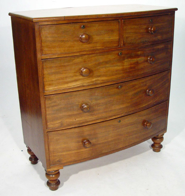 Appraisal: Victorian walnut bow fronted chest fitted two short above three