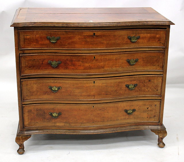 Appraisal: A BURR WALNUT VANEERED SERPENTINE FRONTED CHEST OF FOUR DRAWERS