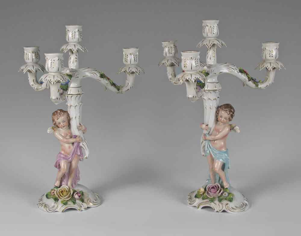 Appraisal: GERMAN DRESDEN PORCELAIN CANDELABRAS Cherub figural stem supports lights ''