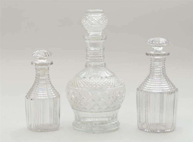 Appraisal: PAIR OF ANGLO-IRISH CUT CRYSTAL GRADUATED DECANTERS AND STOPPERS Together