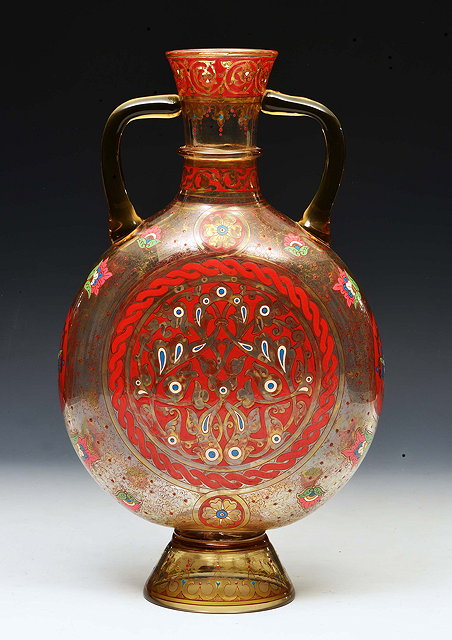 Appraisal: A FRENCH BROCARD PERSIAN STYLE GLASS MOON FLASK with stylistic