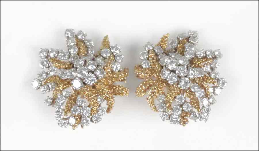 Appraisal: PAIR OF DIAMOND AND KARAT GOLD EARCLIPS round brilliant diamonds