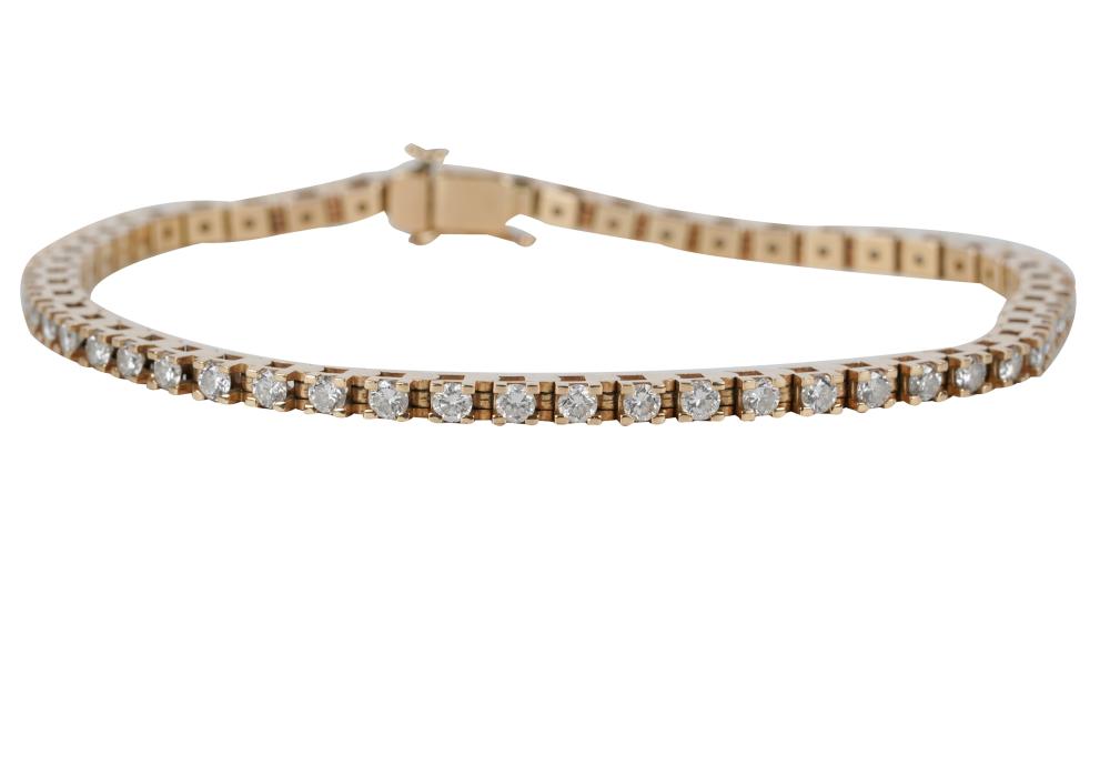 Appraisal: KARAT YELLOW GOLD DIAMOND LINE BRACELETcontaining full cut diamonds H-I