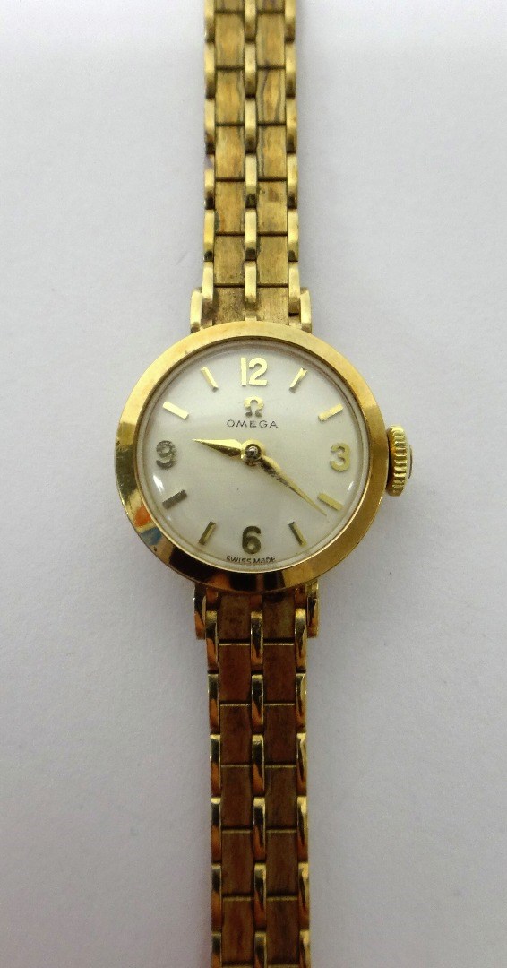 Appraisal: A lady's ct gold Omega bracelet wristwatch the signed circular