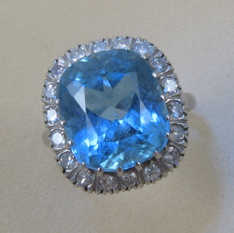 Appraisal: AQUAMARINE AND DIAMOND RING k white gold and centering a