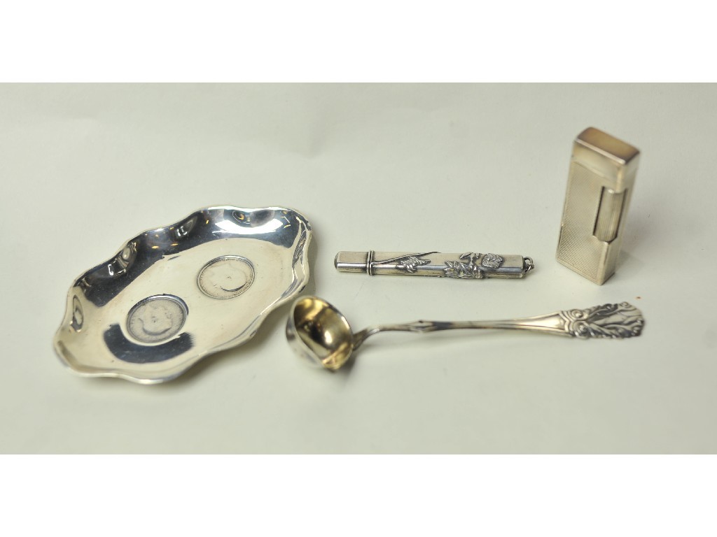 Appraisal: Lot comprising silver dish ladle pencil holder and a Dunhill