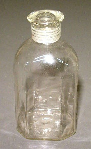 Appraisal: Early blown glass bottle th c eight-sided and with screw-top