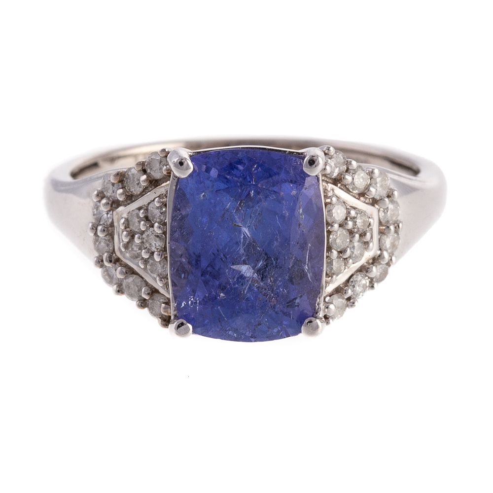 Appraisal: A K Ring Featuring A Tanzanite with Appraisal K white