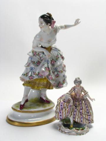 Appraisal: Group Of Two Porcelain Figurines One '' Depicting Curtsying Woman