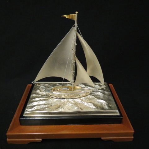 Appraisal: Sterling Silver Sailboat Model by Takehito Japan gold highlights in