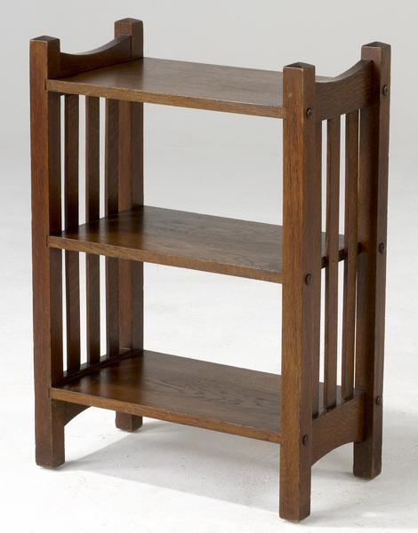 Appraisal: HARDEN Magazine stand with arched upper and lower rails and