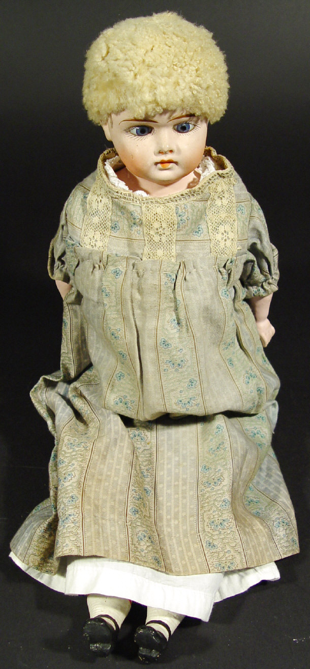 Appraisal: Victorian composite doll with open eyes and cloth dress cm