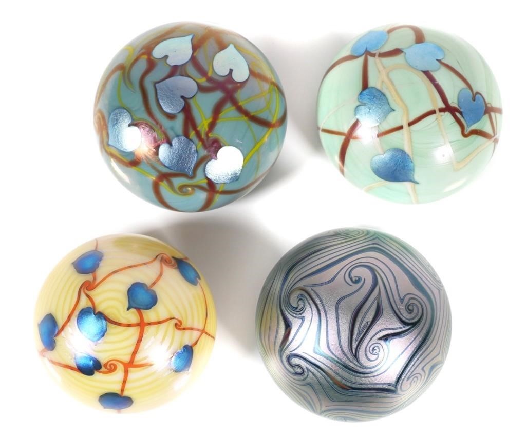 Appraisal: Four vintage Orient and Flume iridescent paperweights with hearts and