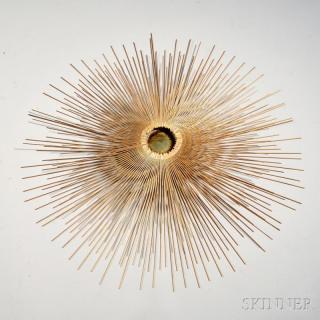 Appraisal: Starburst Wall Sculpture Gilded metal c Thin metal rods radiating