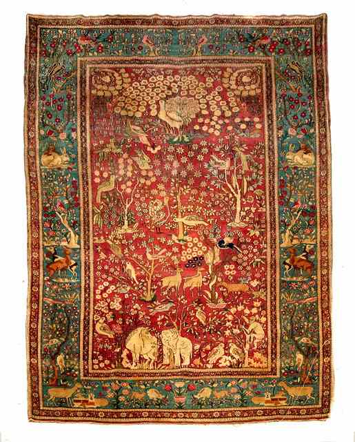 Appraisal: AN ISFAHAN 'GARDEN OF EDEN' RUG decorated with pairs of