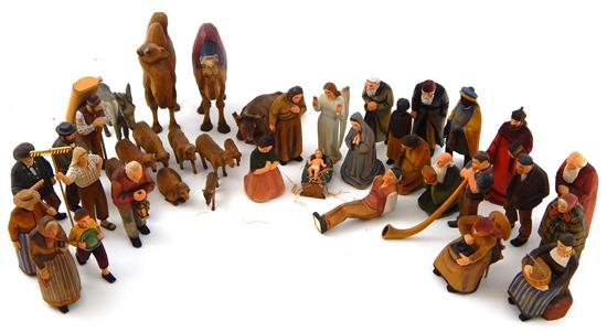 Appraisal: Carved wood figurines Swiss th C pieces two series including