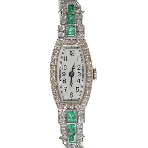 Appraisal: An emerald and diamond cocktail watch c in platinum lugs