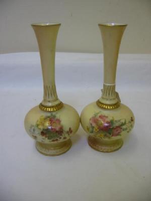 Appraisal: A PAIR OF ROYAL WORCESTER BLUSH PORCELAIN VASES of bottle