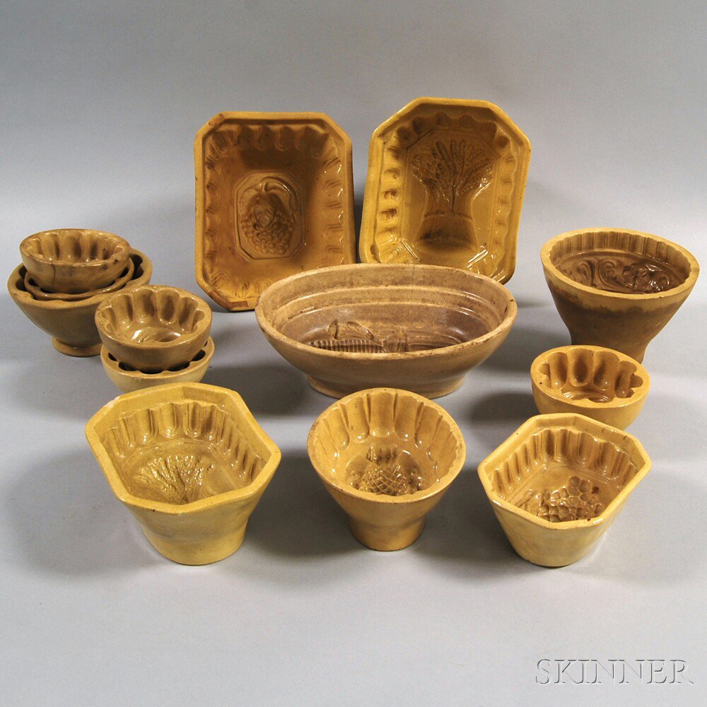 Appraisal: Thirteen Yellowware Food Molds th and th century various designs