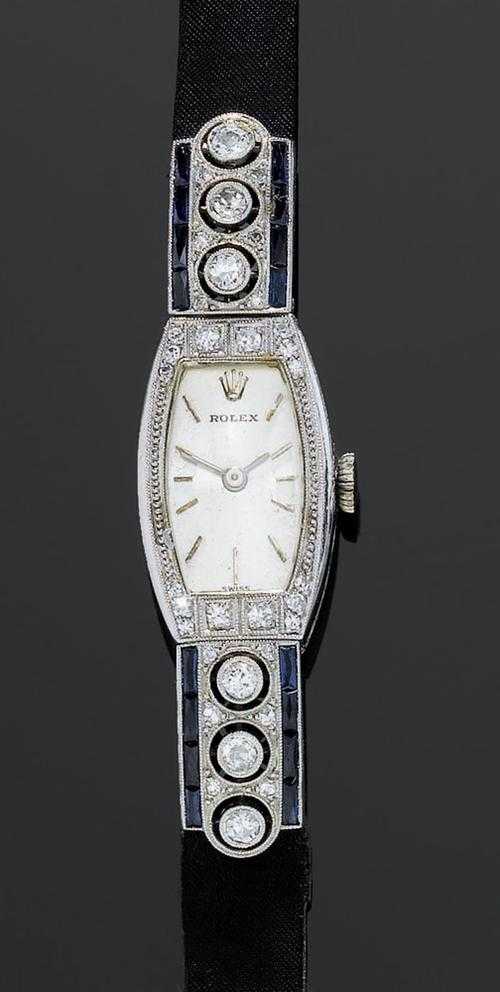 Appraisal: DIAMOND LADY'S WRISTWATCH ROLEX ca Platinum Tonneau-shaped case No signed