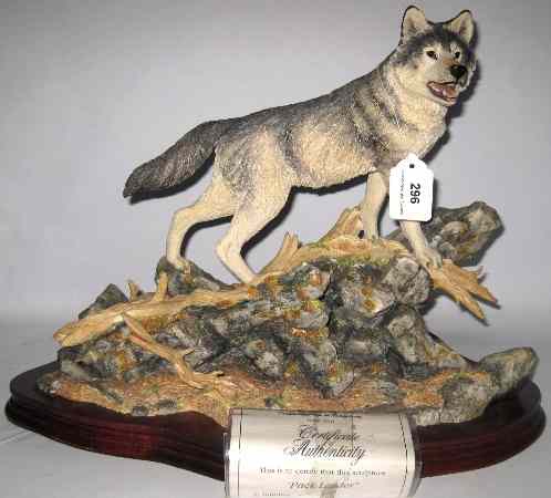 Appraisal: Border Fine Arts Sculpture of a Wolf on a Rock