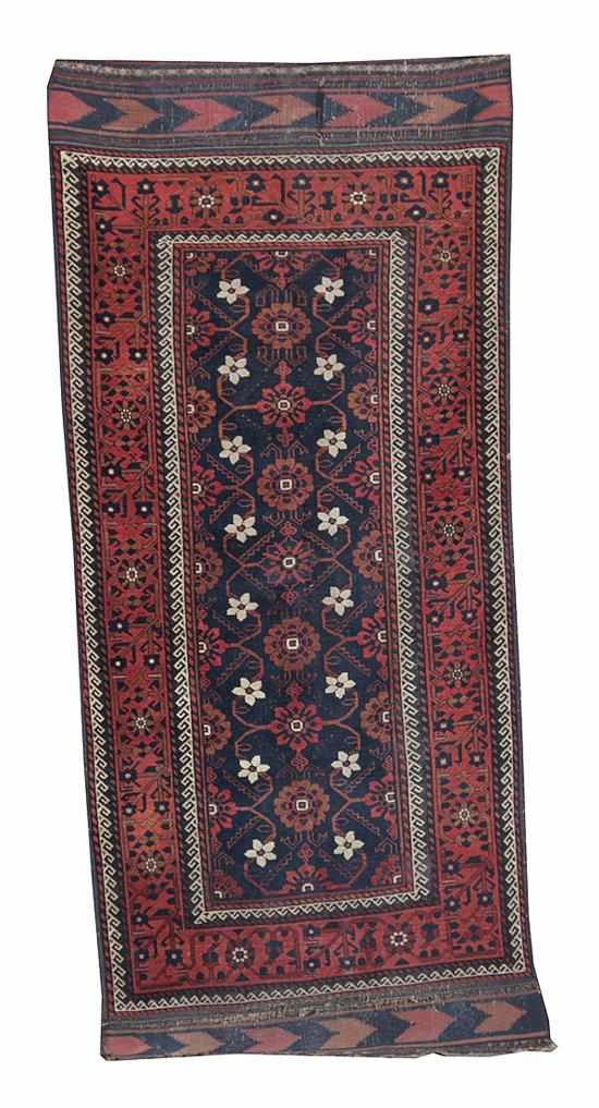 Appraisal: Baluchi and Agra carpets antique Persian Baluchi carpet circa '