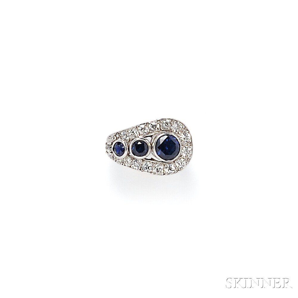 Appraisal: Platinum Sapphire and Diamond Ring bezel-set with three circular-cut sapphires