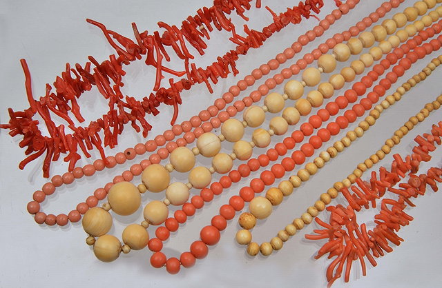 Appraisal: A GRADUATED PINK CORAL BEAD NECKLACE long mm beads down