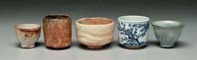 Appraisal: Five pottery tea bowls three Japanese one white and peach