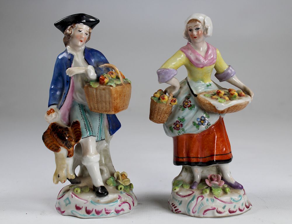 Appraisal: German Sitzendor Porcelain Figurines German Sitzendor Porcelain Figurines Marked on