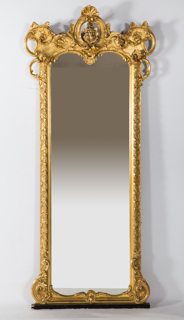 Appraisal: Rococo Revival carved gesso giltwood pier mirror circa foliated scroll