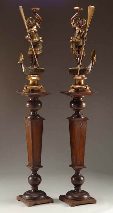 Appraisal: PAIR OF BLACKAMORE FIGURES ON MAHOGANY CARVED PEDESTALS Blackamore boys