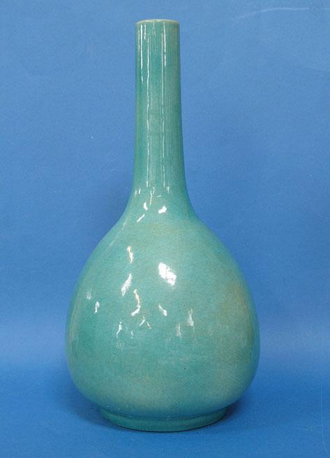 Appraisal: A CHINESE MONOCHROME BOTTLE VASE covered in a turquoise glaze